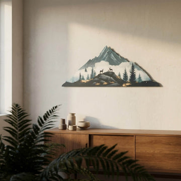 Deer and mountain silhouette UV printed metal wall art above a wooden sideboard