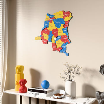 Flag colored Democratic Republic of the Congo wooden wall map beside a sheer curtain, angled view