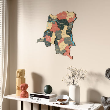 Sage Democratic Republic of the Congo wooden wall map beside a sheer curtain, angled view