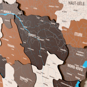 Close-up of the Soil Democratic Republic of the Congo wooden wall map with layered regions and printed names