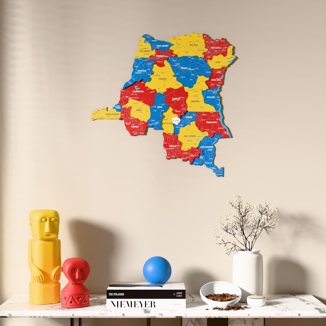 Flag colored Democratic Republic of the Congo wooden wall map above a marble console, front view