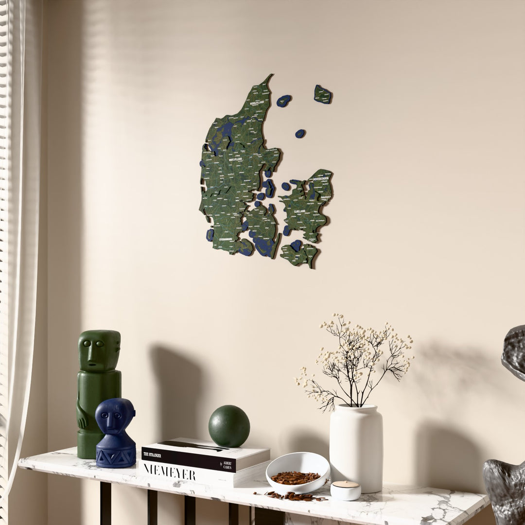Satellite Denmark wooden wall map beside a sheer curtain, angled view
