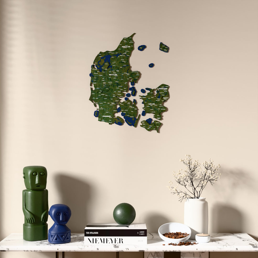Satellite Denmark wooden wall map above a marble console, front view