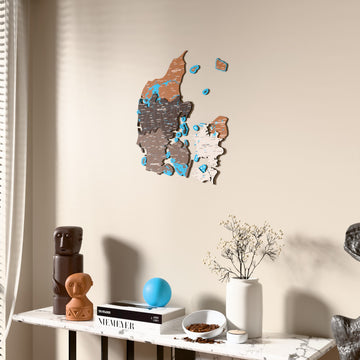 Soil Denmark wooden wall map beside a sheer curtain, angled view