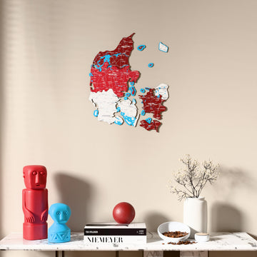Flag colored Denmark wooden wall map above a marble console, front view