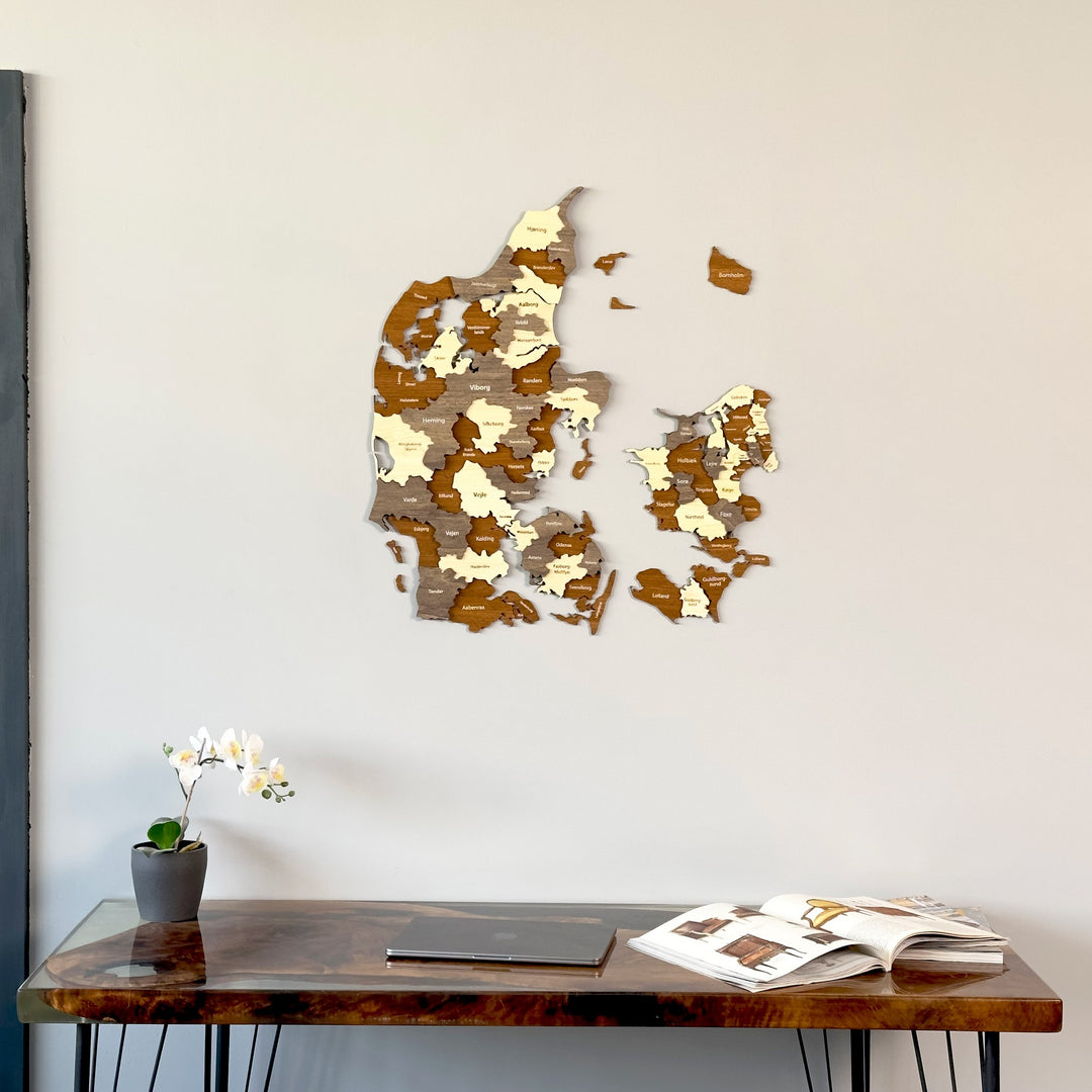 Denmark wooden wall map closer view above a dark desk