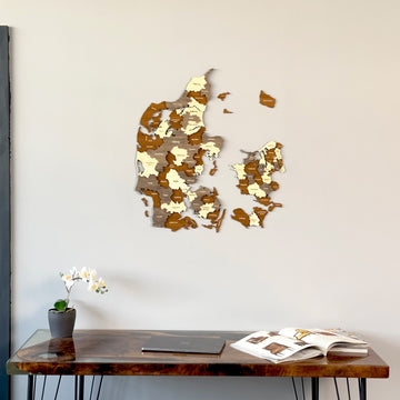 Denmark wooden wall map closer view above a dark desk