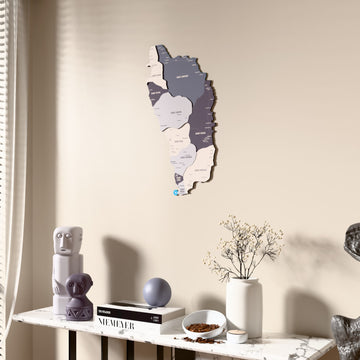 Nimbus Dominica wooden wall map beside a sheer curtain, angled view
