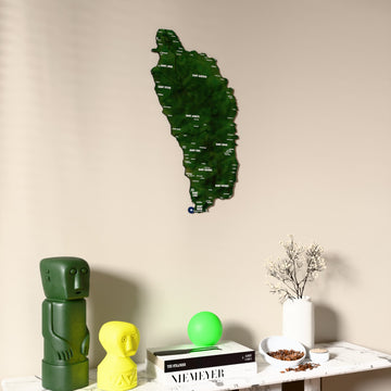Satellite Dominica wooden wall map on a beige wall above a console with figurines