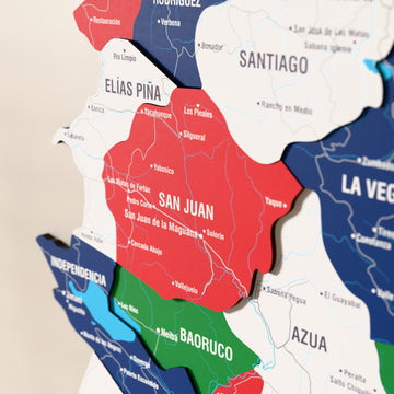 Close-up of the Flag colored Dominican Republic wooden wall map with layered regions and printed names