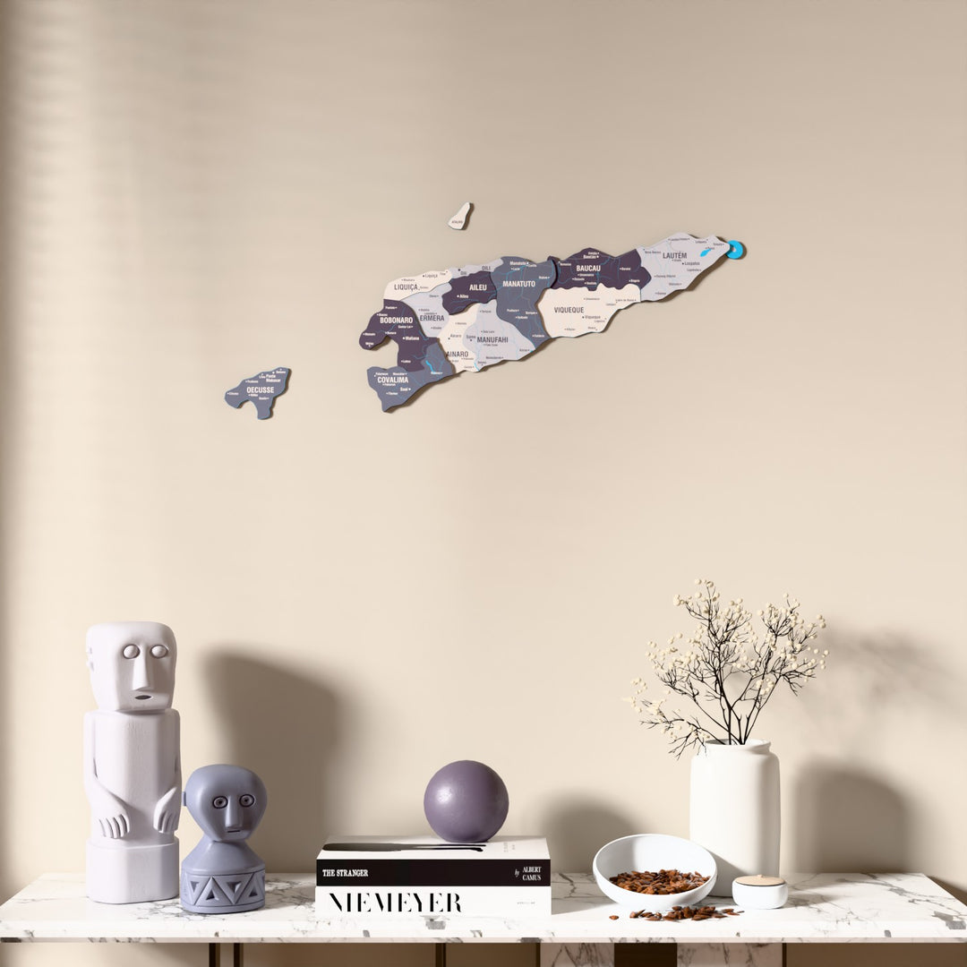 Nimbus East Timor wooden wall map above a marble console, front view