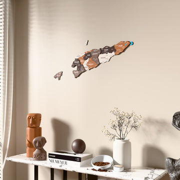 Soil East Timor wooden wall map beside a sheer curtain, angled view