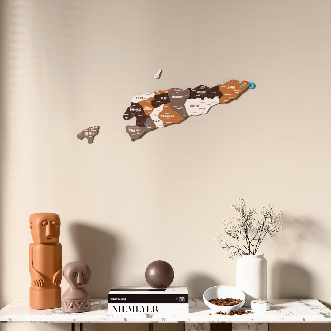 Soil East Timor wooden wall map above a marble console, front view