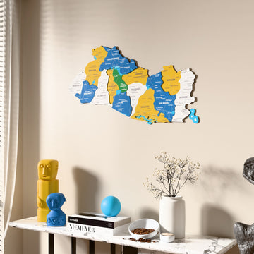 Flag colored El Salvador wooden wall map beside a sheer curtain, angled view