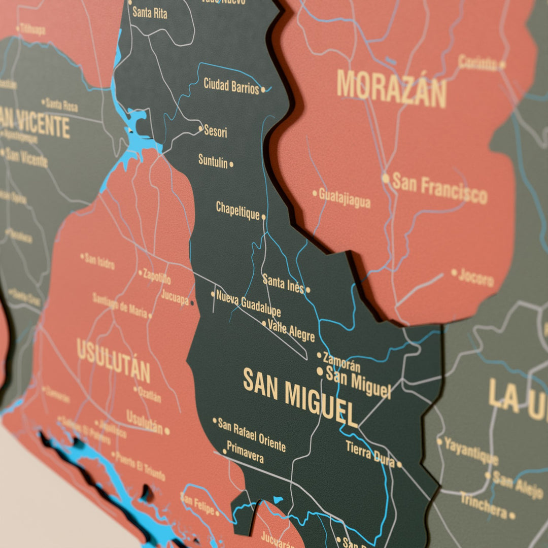 Close-up of the Sage El Salvador wooden wall map with layered regions and printed names