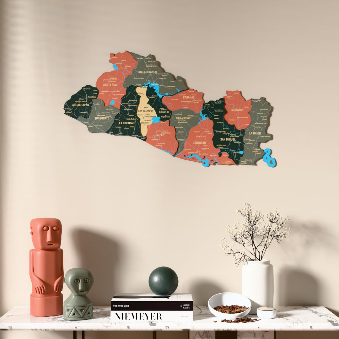 Sage El Salvador wooden wall map above a marble console, front view