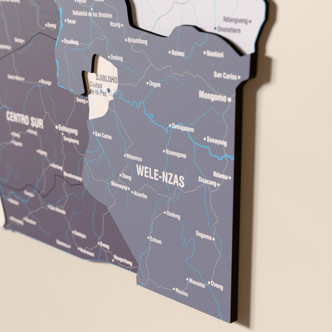 Close-up of the Nimbus Equatorial Guinea wooden wall map with layered regions and printed names