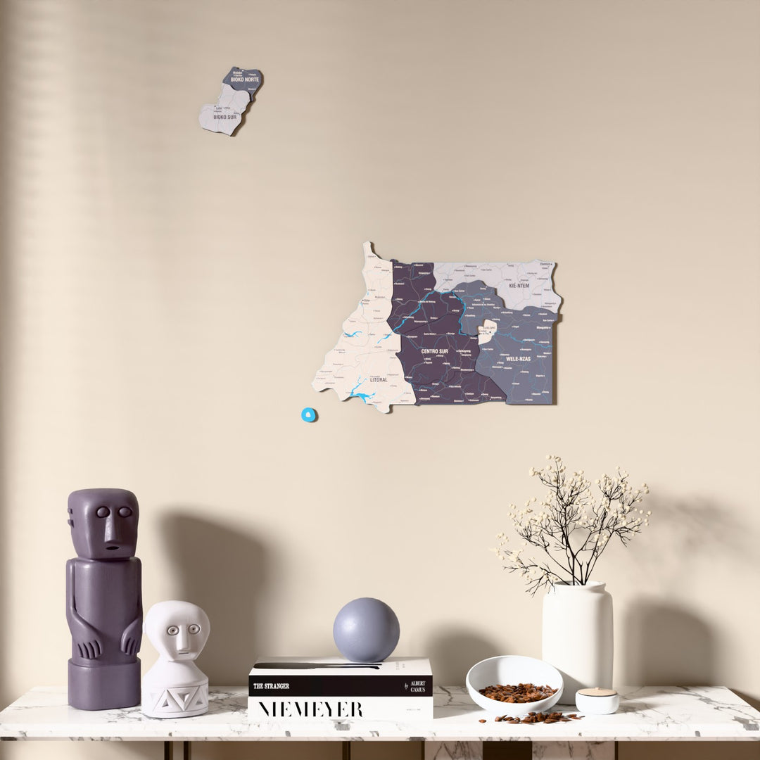 Nimbus Equatorial Guinea wooden wall map above a marble console, front view