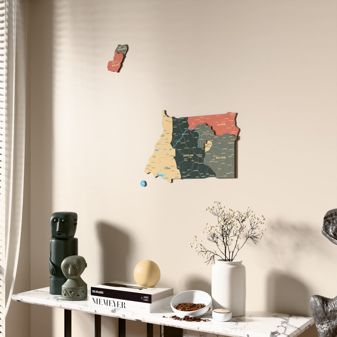 Sage Equatorial Guinea wooden wall map beside a sheer curtain, angled view