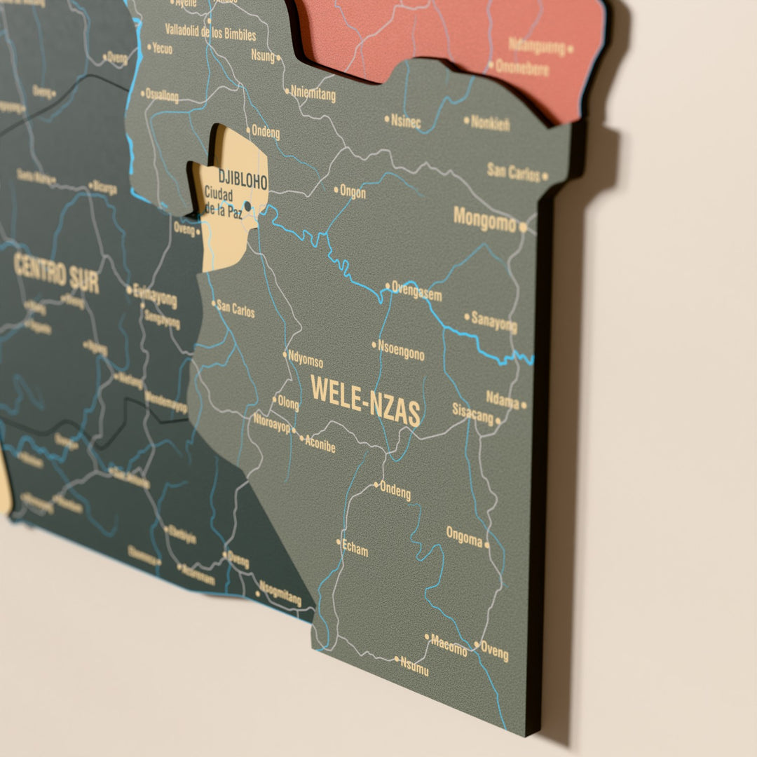 Close-up of the Sage Equatorial Guinea wooden wall map with layered regions and printed names