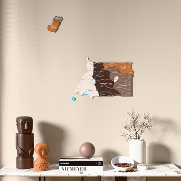 Soil Equatorial Guinea wooden wall map above a marble console, front view