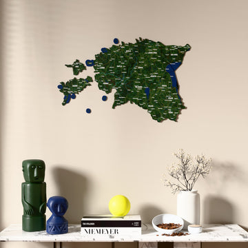 Satellite Estonia wooden wall map above a marble console, front view