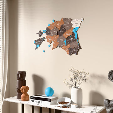 Soil Estonia wooden wall map beside a sheer curtain, angled view