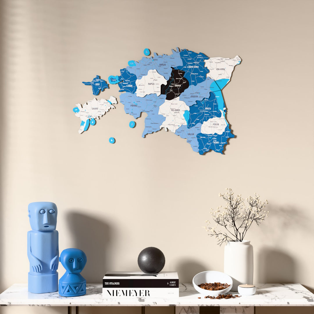 Flag colored Estonia wooden wall map above a marble console, front view