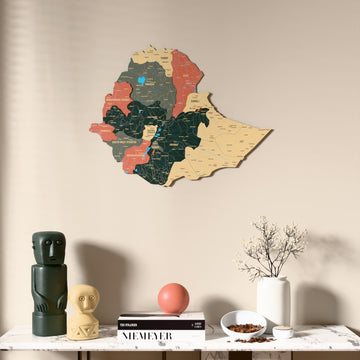 Sage Ethiopia wooden wall map above a marble console, front view