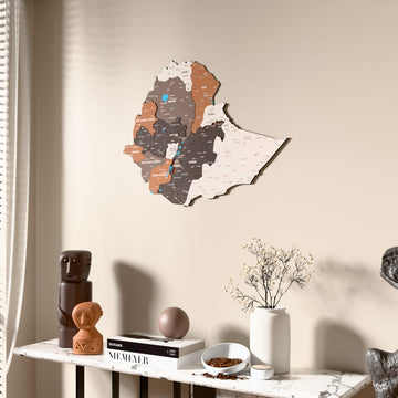 Soil Ethiopia wooden wall map beside a sheer curtain, angled view