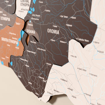 Close-up of the Soil Ethiopia wooden wall map with layered regions and printed names