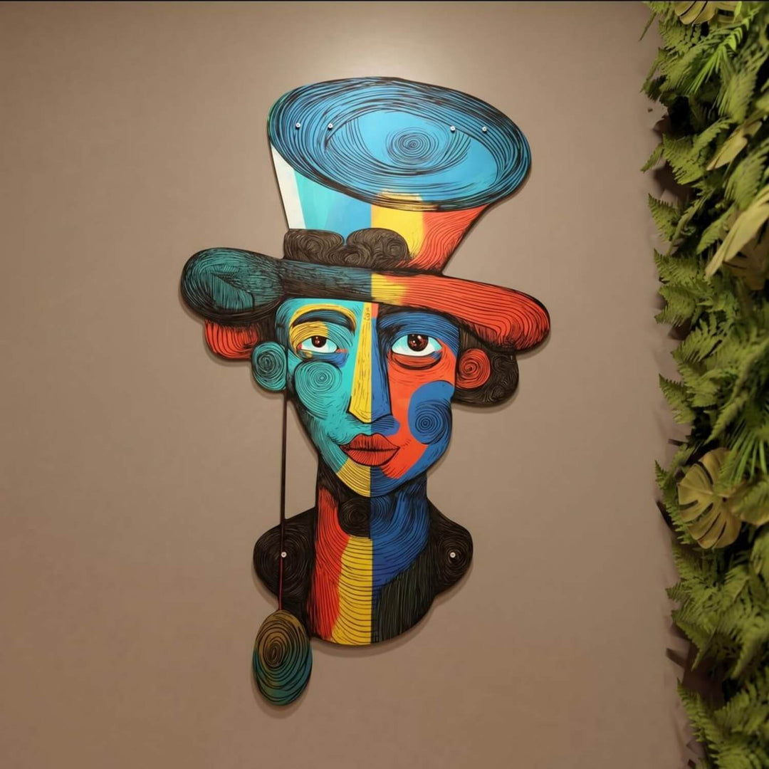 Fauvist surrealist portrait metal wall art on a beige wall with green leaves