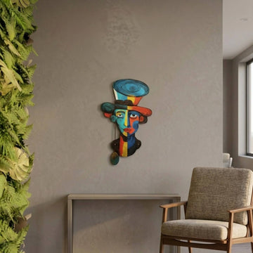 Fauvist portrait metal wall art above a console next to an armchair
