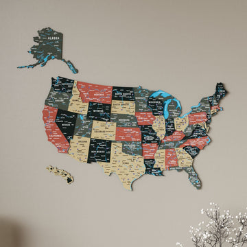 Sage United States wooden wall map, slightly angled close view with blue lakes and white flowers at the corner
