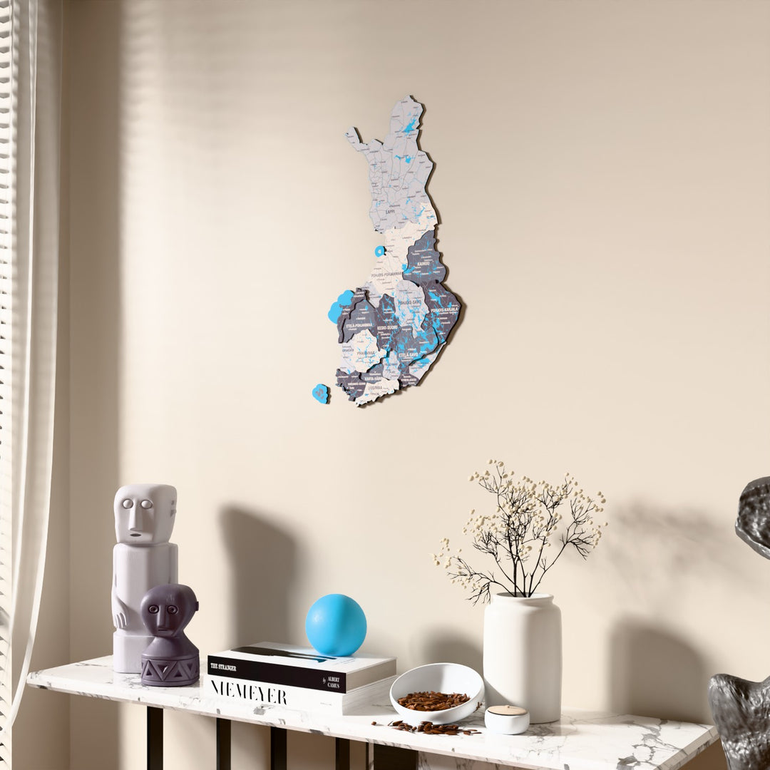 Nimbus Finland wooden wall map beside a sheer curtain, angled view