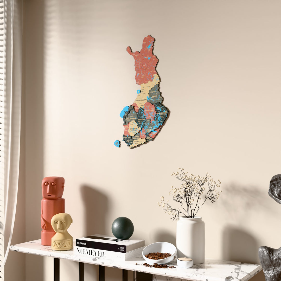 Sage Finland wooden wall map beside a sheer curtain, angled view