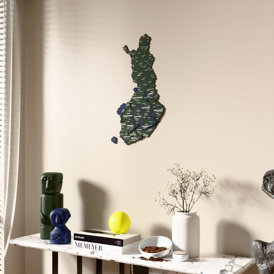 Satellite Finland wooden wall map beside a sheer curtain, angled view
