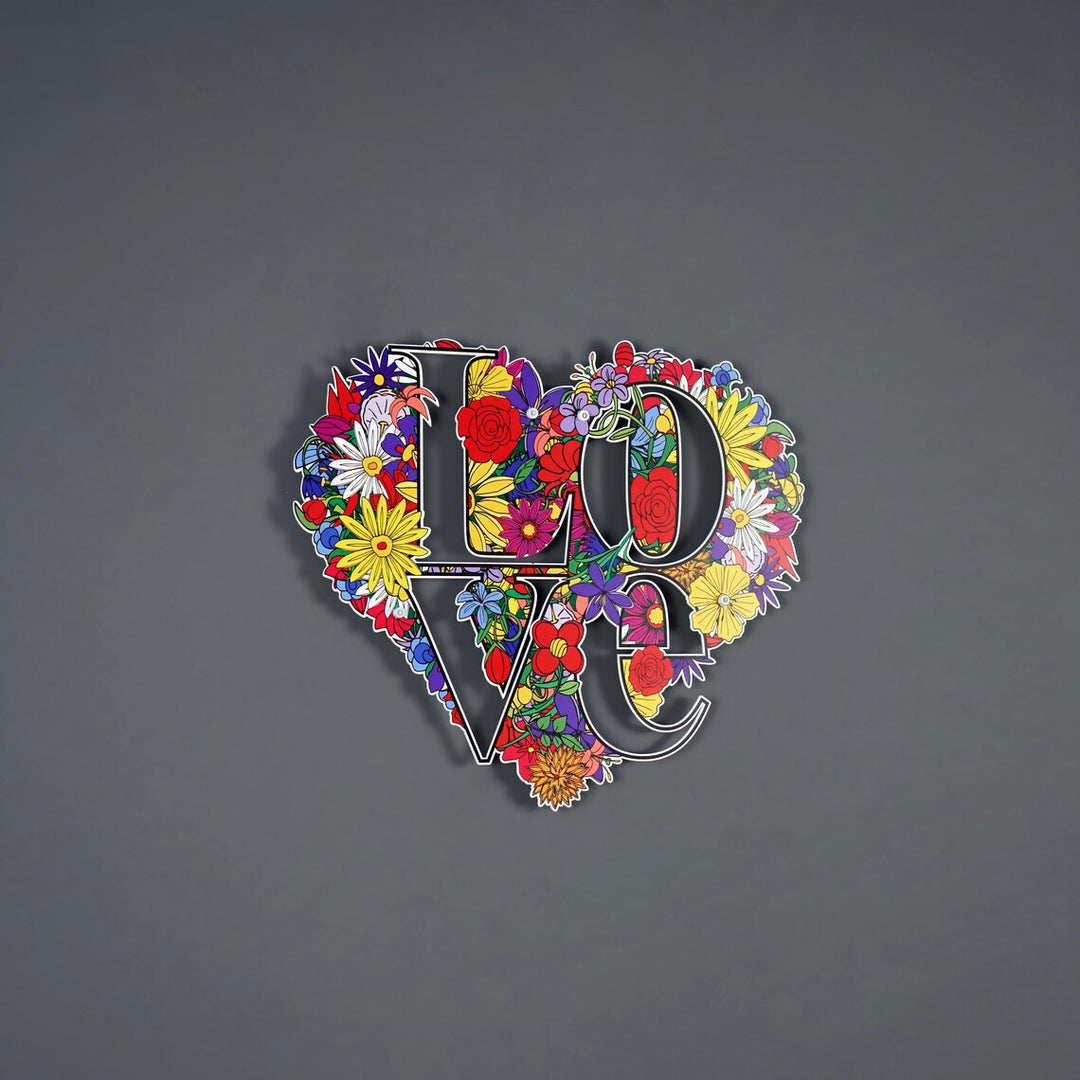 Floral LOVE heart metal art in the middle of a grey wall
