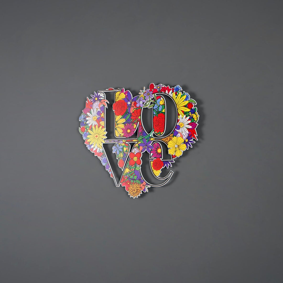 Floral LOVE heart metal art on a grey wall, wide shot