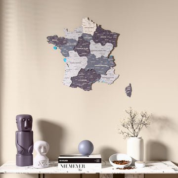 Nimbus France wooden wall map above a marble console, front view