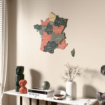 Sage France wooden wall map beside a sheer curtain, angled view
