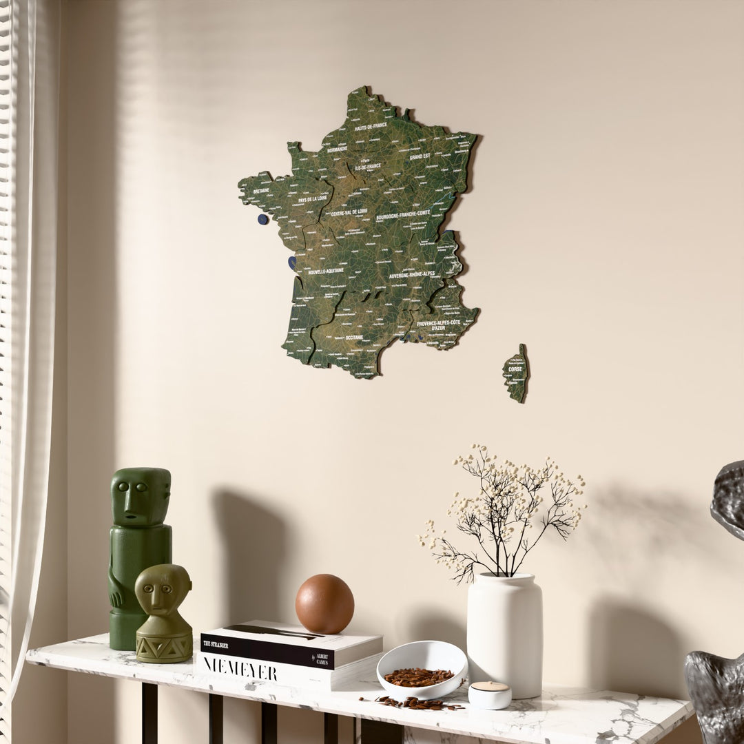 Satellite France wooden wall map beside a sheer curtain, angled view