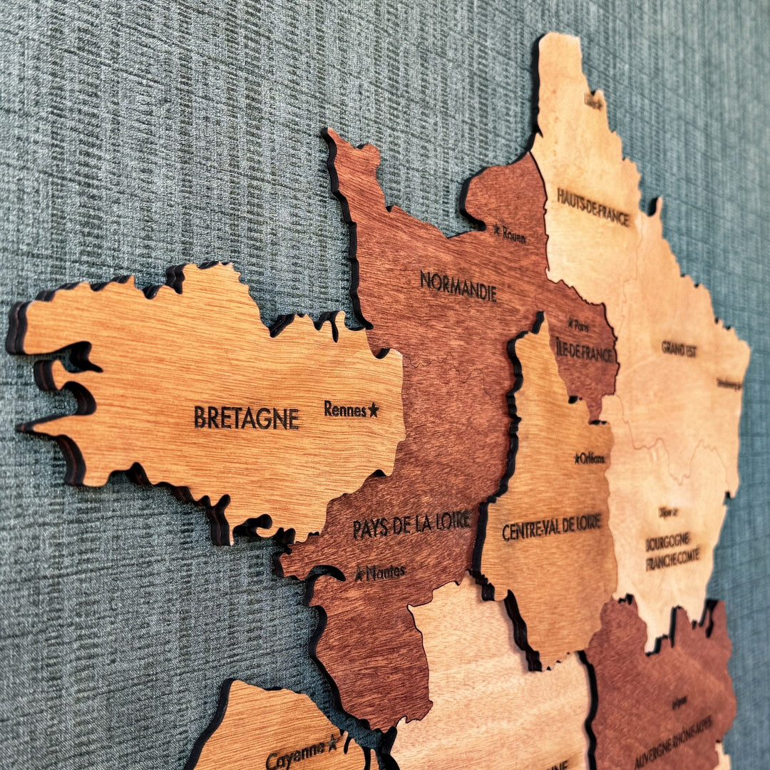 Close-up of Bretagne, Normandie and Pays de la Loire layers on the wooden France map