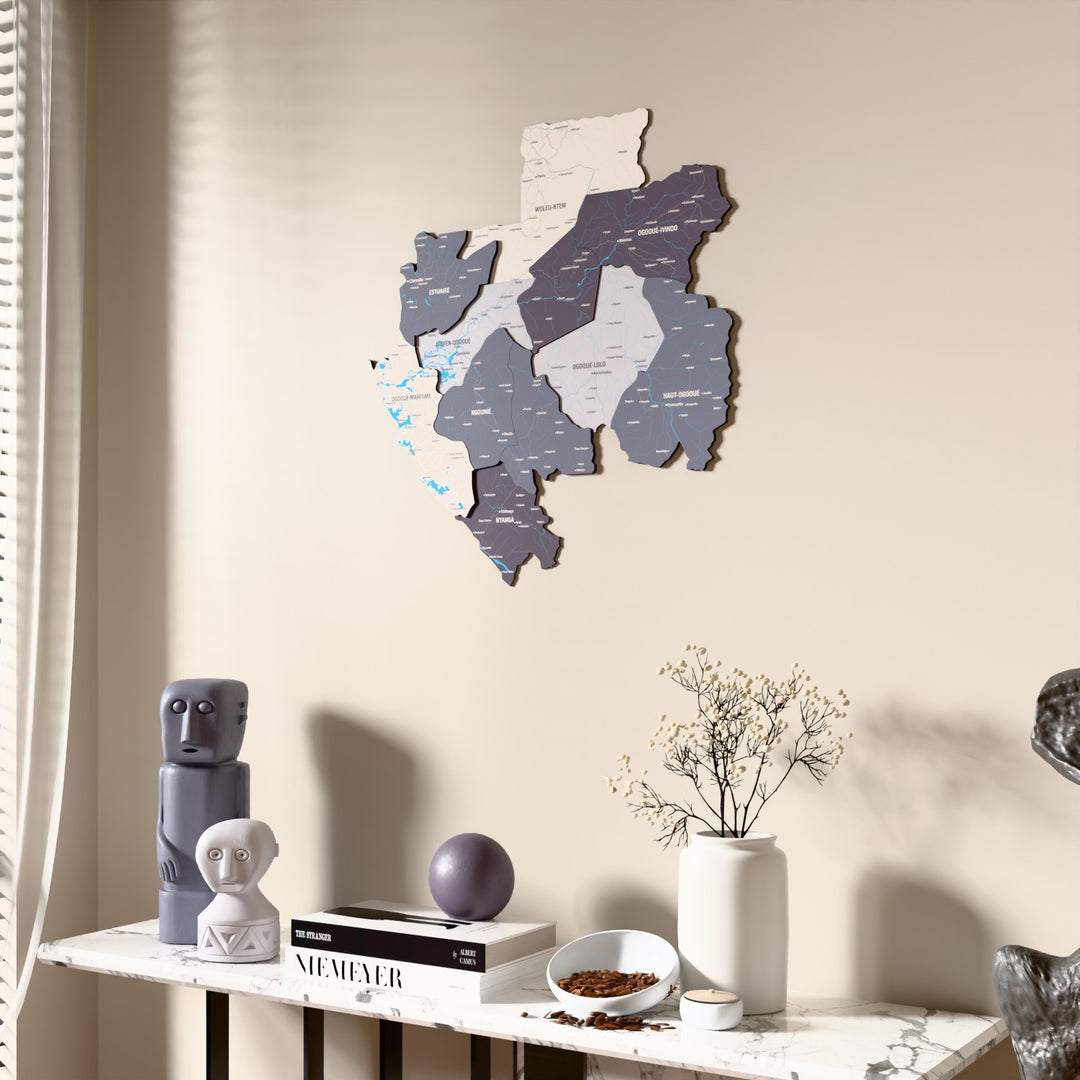 Nimbus Gabon wooden wall map beside a sheer curtain, angled view