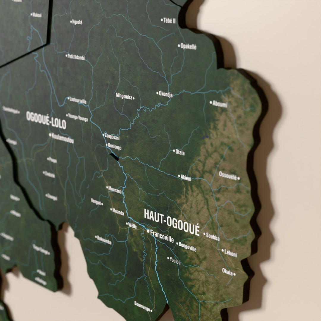 Close-up of the Satellite Gabon wooden wall map with layered regions and printed names