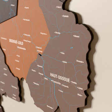 Close-up of the Soil Gabon wooden wall map with layered regions and printed names