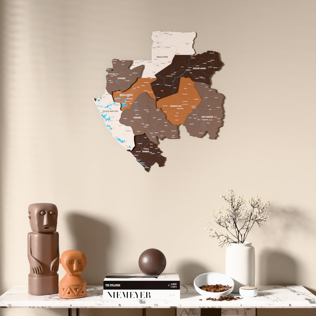 Soil Gabon wooden wall map above a marble console, front view