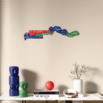 Flag colored Gambia wooden wall map above a marble console, front view