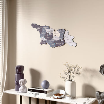 Nimbus Georgia wooden wall map beside a sheer curtain, angled view