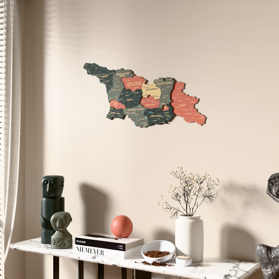 Sage Georgia wooden wall map beside a sheer curtain, angled view